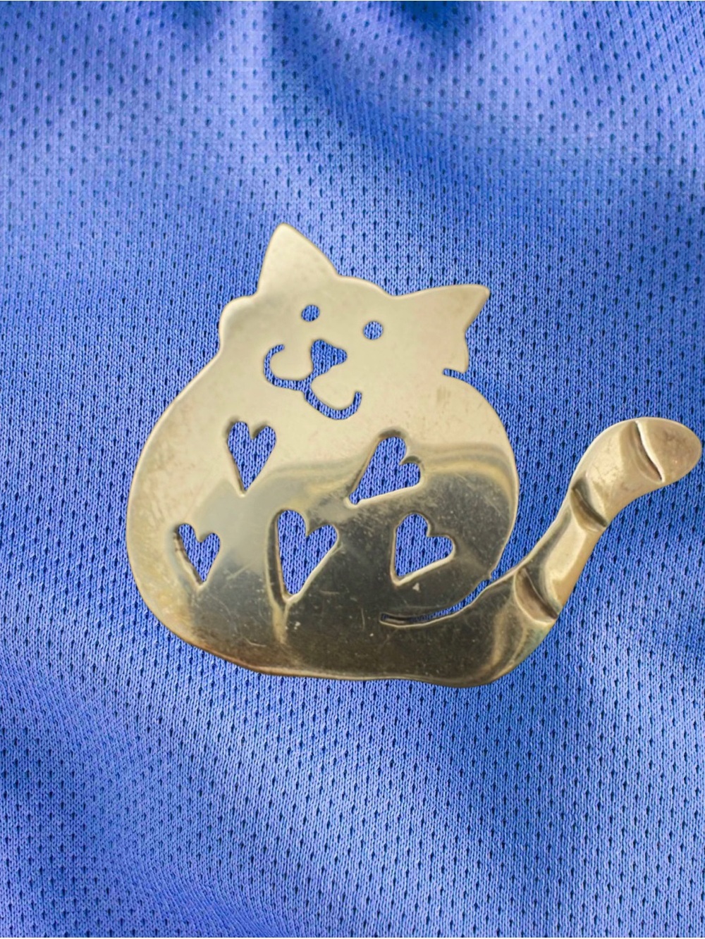 A vintage 925 sterling silver cat brooch from the designer brand Far Fetched.